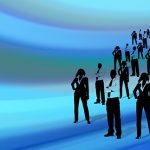 Silhouettes in formal attire on a vibrant gradient background, representing unity in Montrose County real estate.