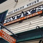 Restaurant sign for "Fatty's Pizzeria & Pasta", highlighting commercial real estate updates in Vail/Eagle County.