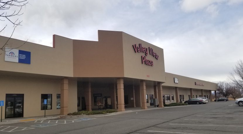 Valley View Plaza retail center exterior with prominent signage, featuring storefronts and parking area, located in Delta, CO, highlighting available retail spaces for lease.