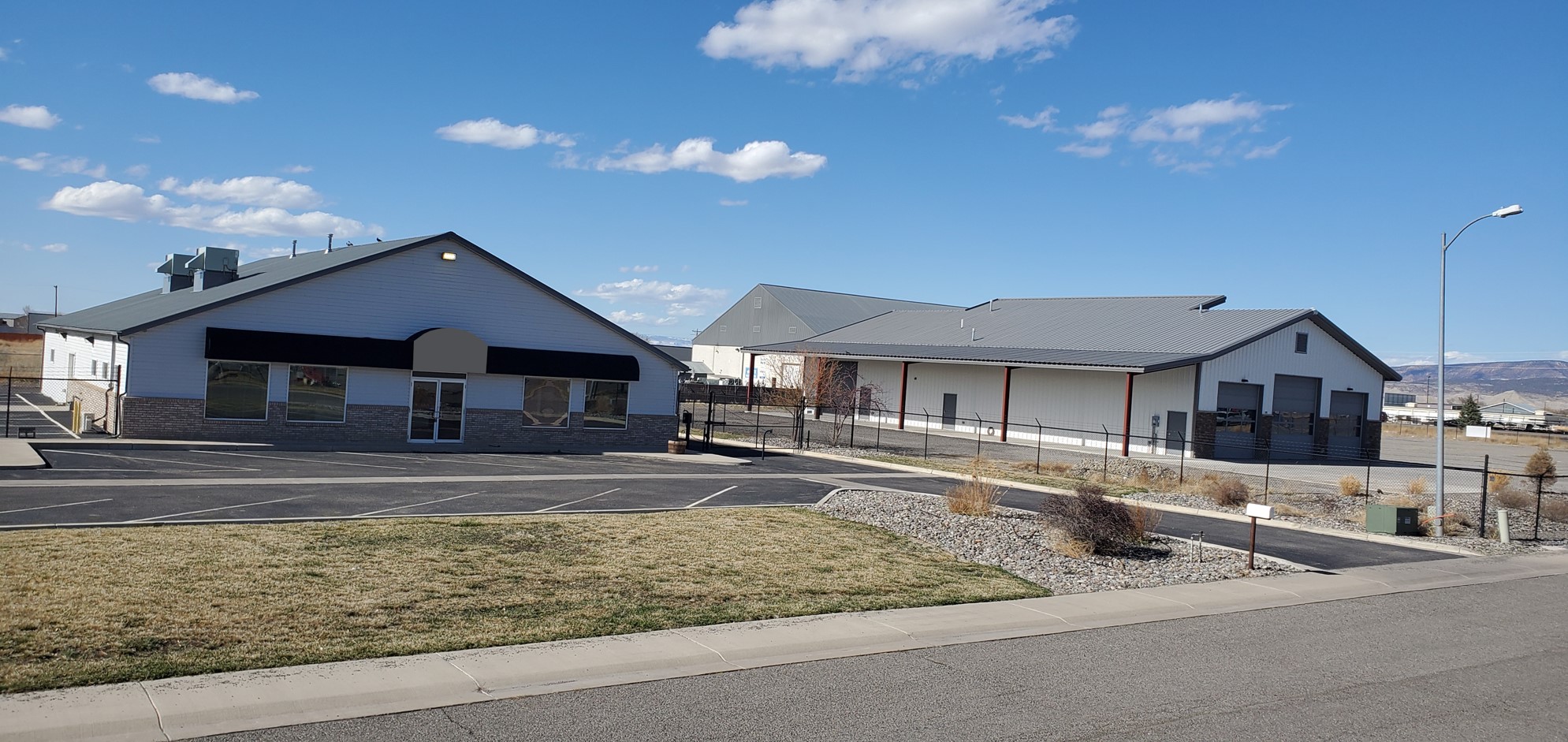Front of both bldgs (no sign letters) Rocky Mountain Commercial Real