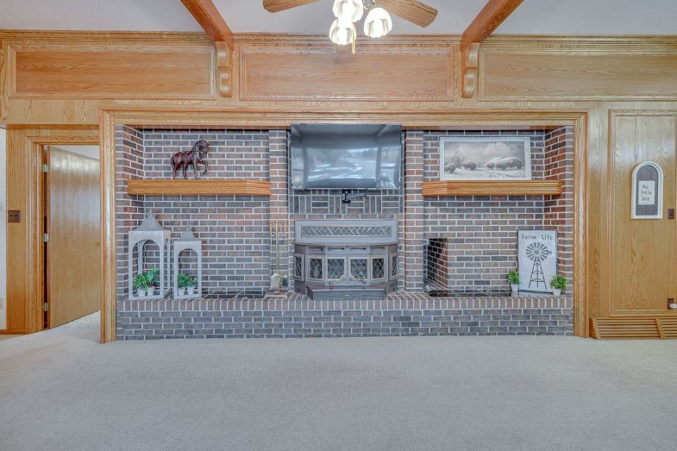 JEB Ranch main residence family room fireplace